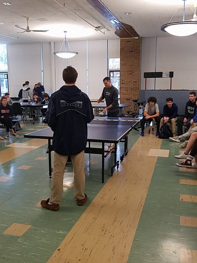 Mr. Maher playing table tennis