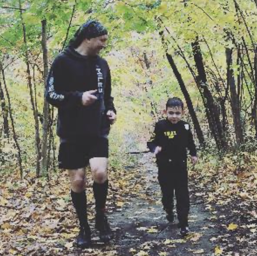 David Veling runs a 5k with his son. 