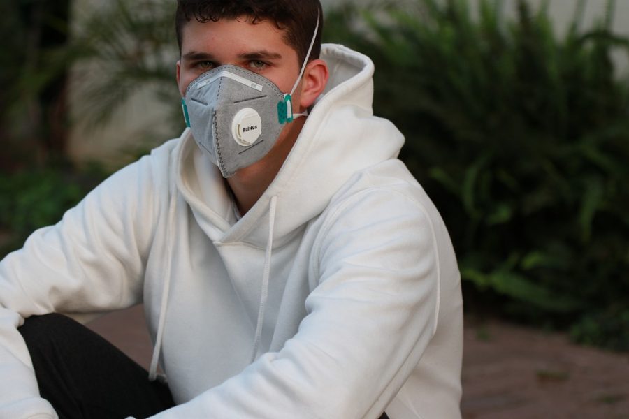Teens now wear masks and try to keep busy during social distancing 