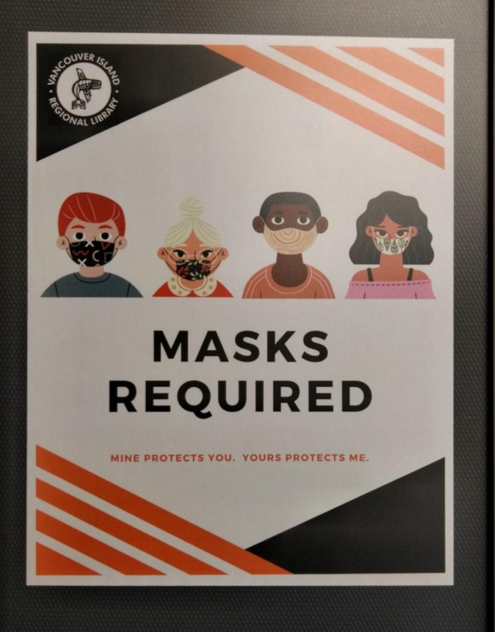 A notice that masks are required at a New England middle school.