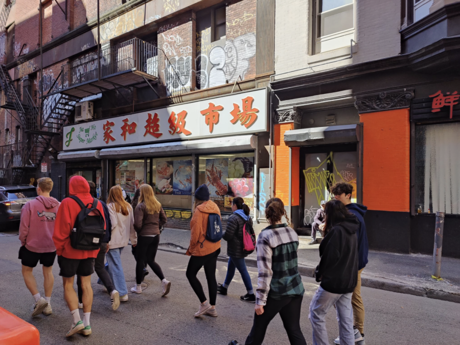 Senior Mandarin students walk around Bostons Chinatown