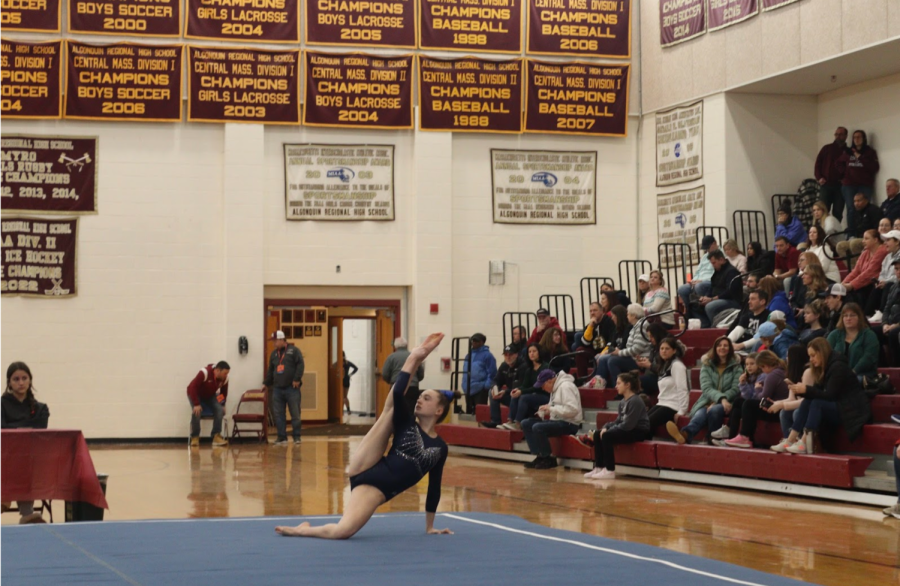 Freshman Amelia Franklin from Manchester Essex high school competing floor. 