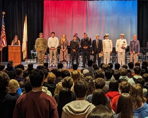 Members of the military attend the HWRHS Memorial Day assembly on Friday, May 26, 2023 .