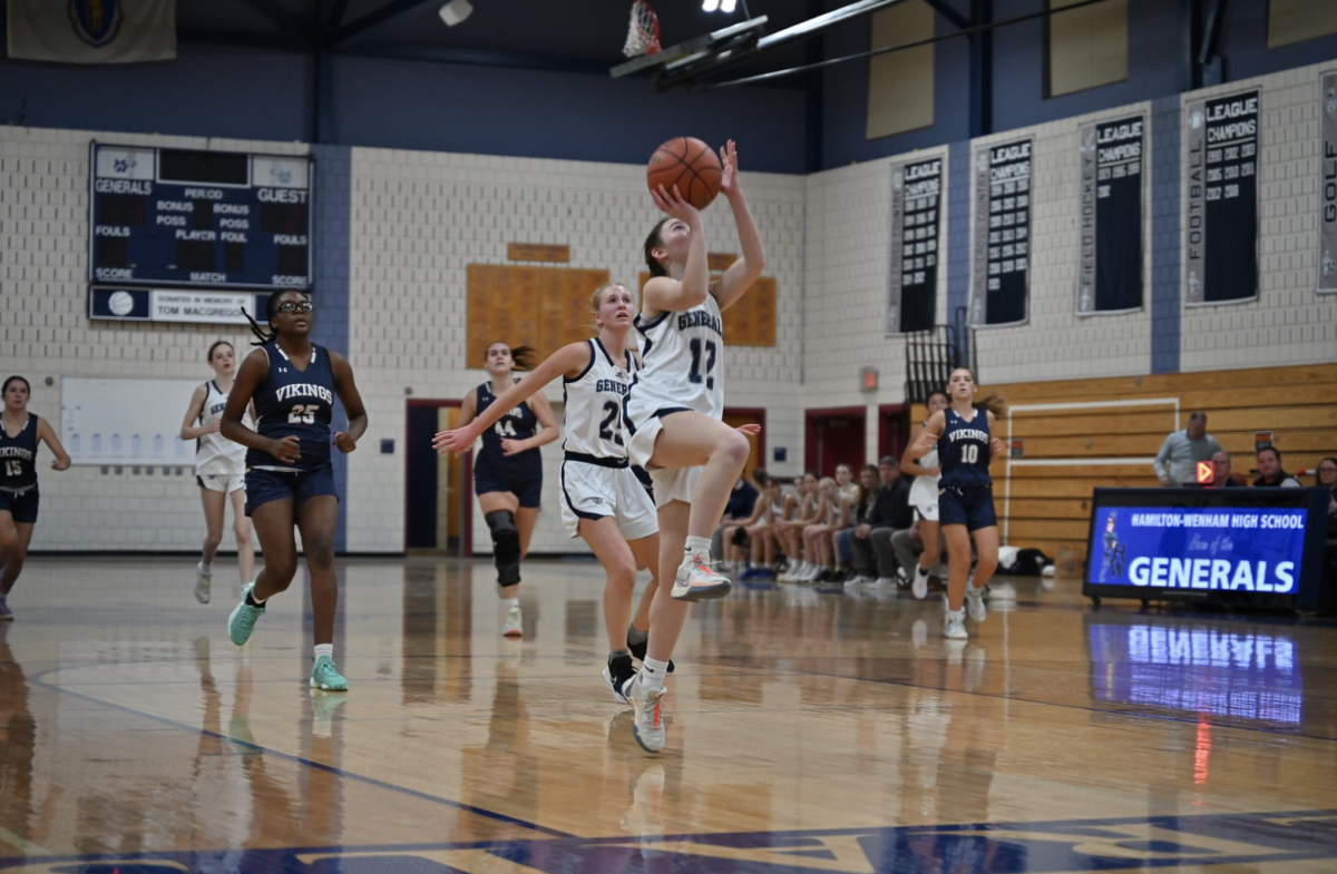 Junior Annie Moynihan goes up for a layup during the 2nd quarter against Winthrop on December 12th, 2023.