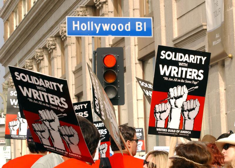(FILES) This November 20, 2007 photo shows demonstrators holding signs during the 20072008 Writers Guild of America strike in Hollywood. Thousands of Hollywood television and movie writers will go on strike May 2, 2023, their union said, after talks with studios and streamers over pay and other conditions ended without a deal. (Photo by Chris Delmas / AFP)