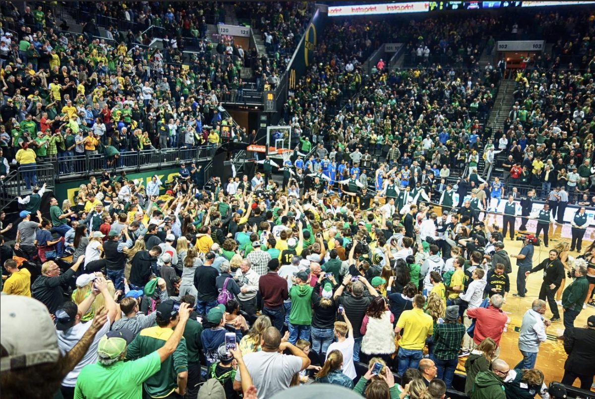This+photo+shows+Oregon+fans+storming+the+court+after+their+upset+win+over+UCLA+on+December+28%2C+2016.+%28Via+Flickr%2C+Drburtoni%29