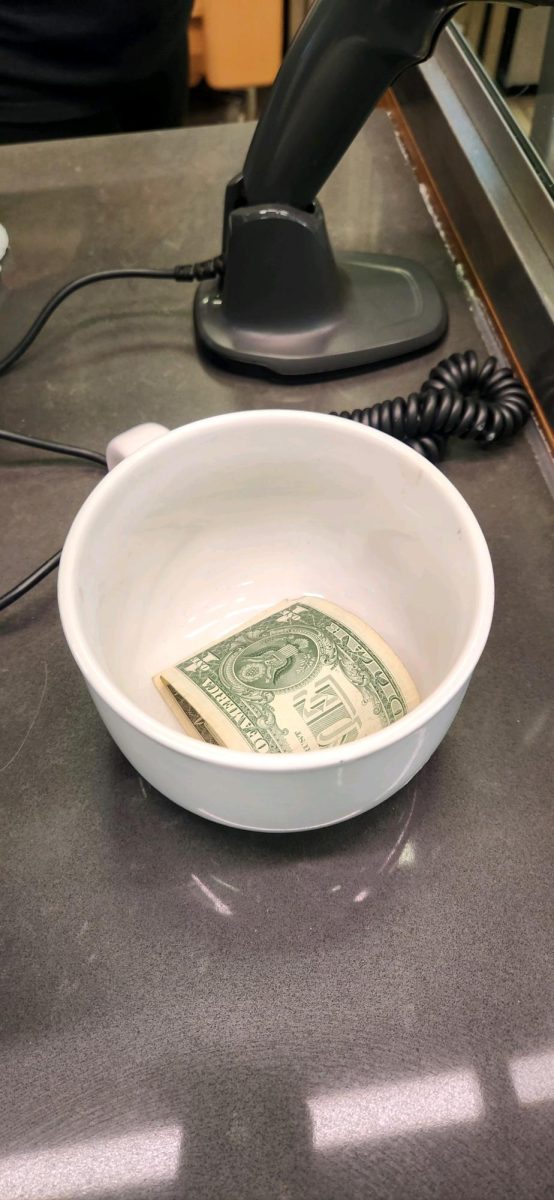 Tip jar; Dunkin Donuts Gloucester MA, only $1 in the jar during morning rush hour