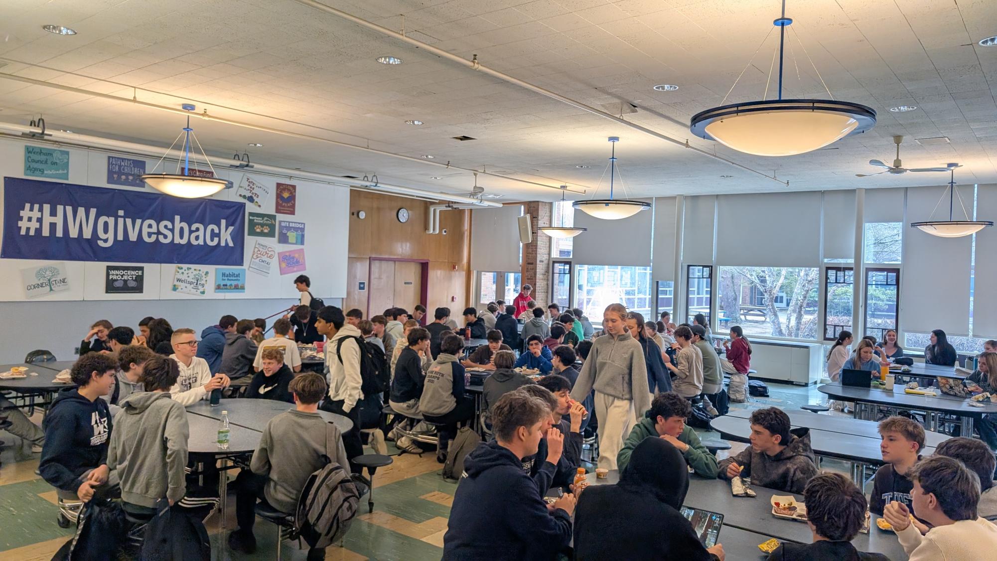 Student may use computers, instead of phones, during lunch time.  However, mostly it's talking face-to-face. 