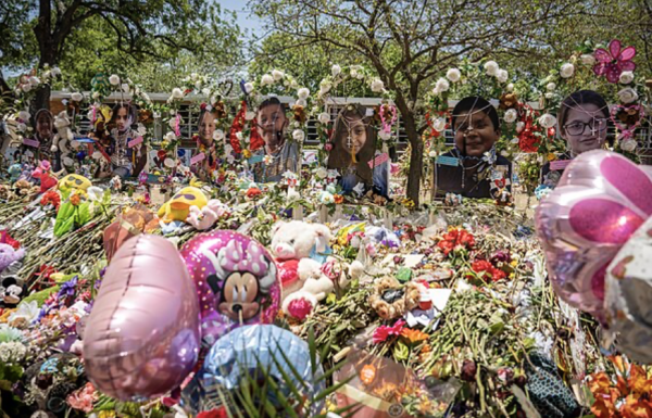 On June 6th, 2022, Alejandro Mayorkas visits a memorial site commemorating the victims of the Uvalde school shooting, which killed 19 children and 2 teachers. (DHS)